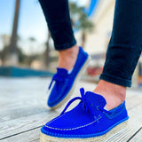 Blue espadrille boat shoes with lace-up ties and textured jute-wrapped sole