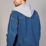 Men's blue oversized denim jacket with gray hood, back yoke seam
