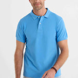 Men's blue polo shirt with short sleeves, button placket, and ribbed collar