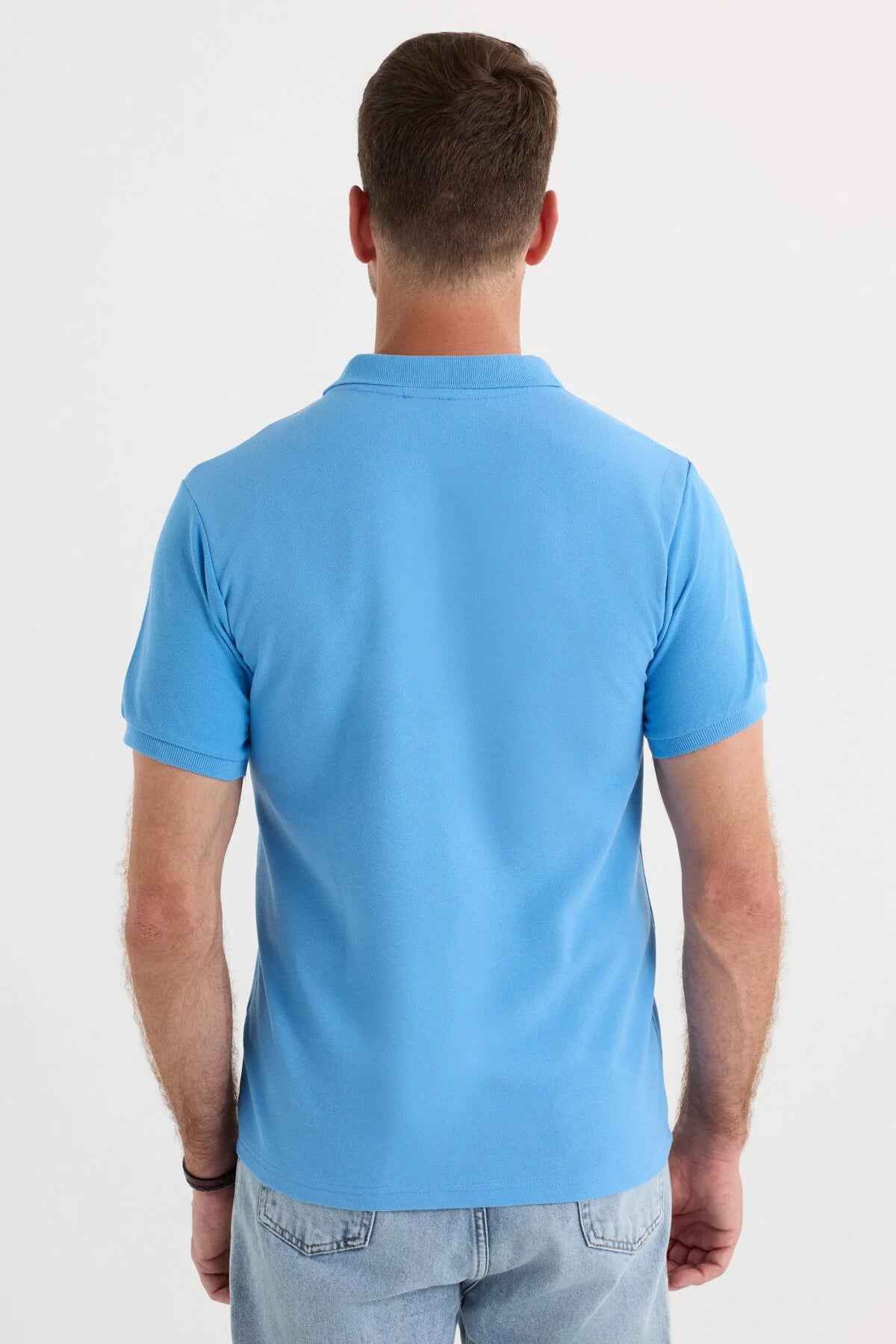 Blue polo shirt back view with short sleeves and ribbed collar