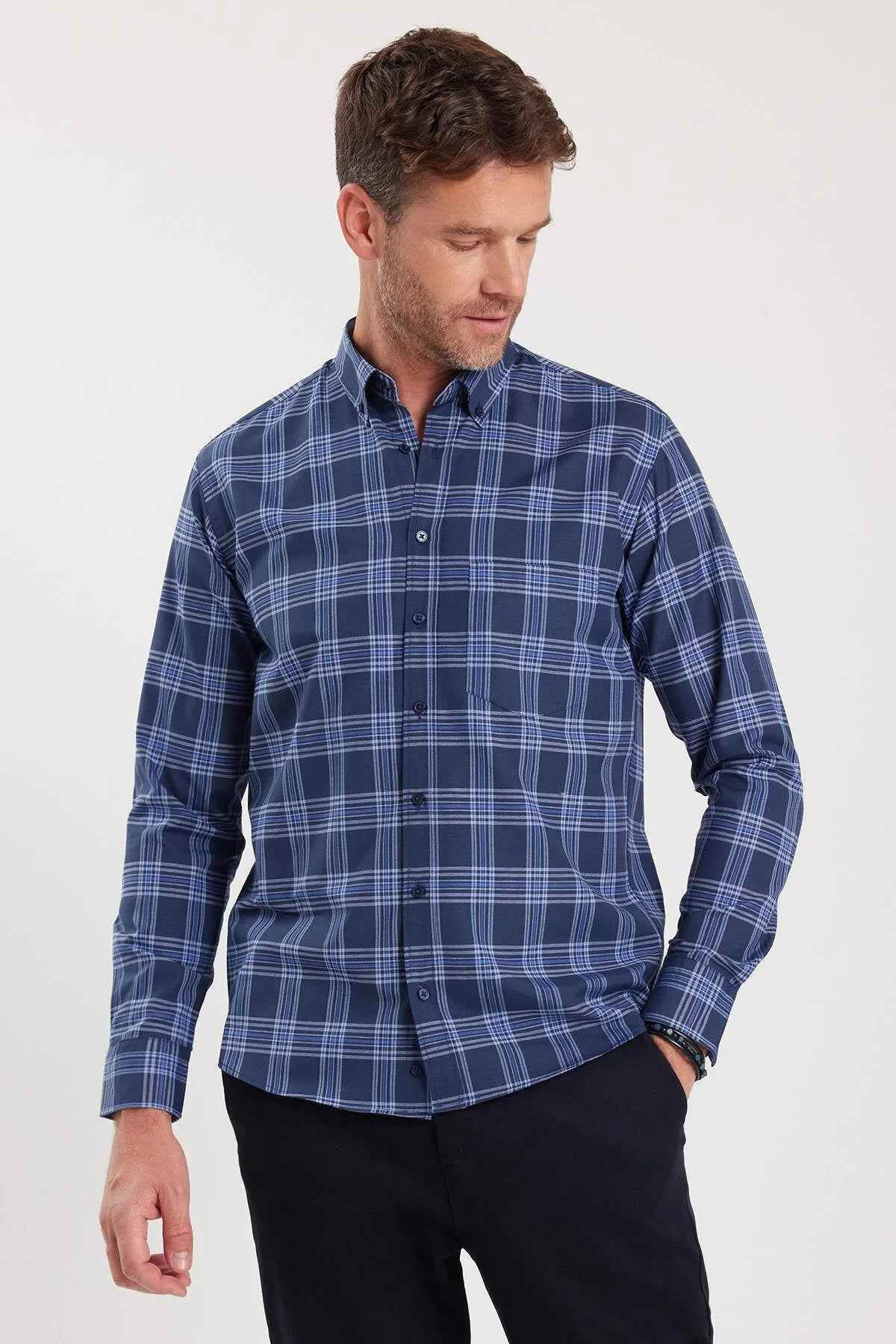 Men's blue plaid button-up shirt with long sleeves, button front, and collar.