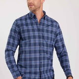 Men's blue plaid button-up shirt with long sleeves and button-front closure.