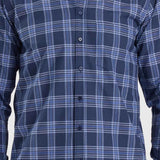 Men's blue plaid button-up shirt with pointed collar and button placket.