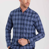 Men's blue plaid button-up shirt with long sleeves and button-front closure.