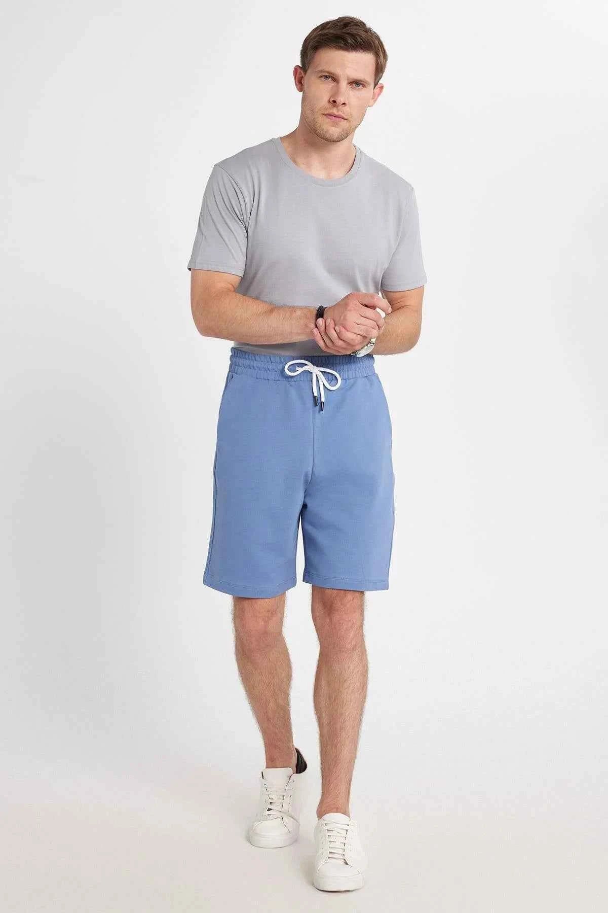 Men's blue drawstring shorts with elastic waistband and side pockets