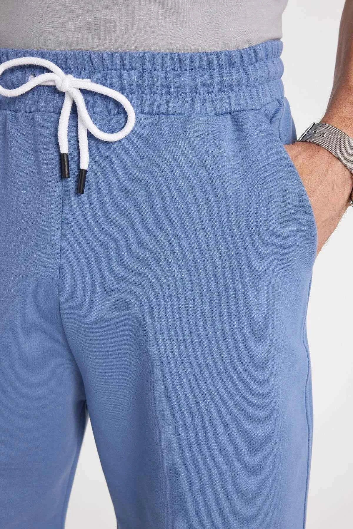 TDRS men's blue drawstring shorts with elastic waistband, side view