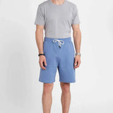 Men's blue shorts with elastic waistband and drawstring, knee-length fit