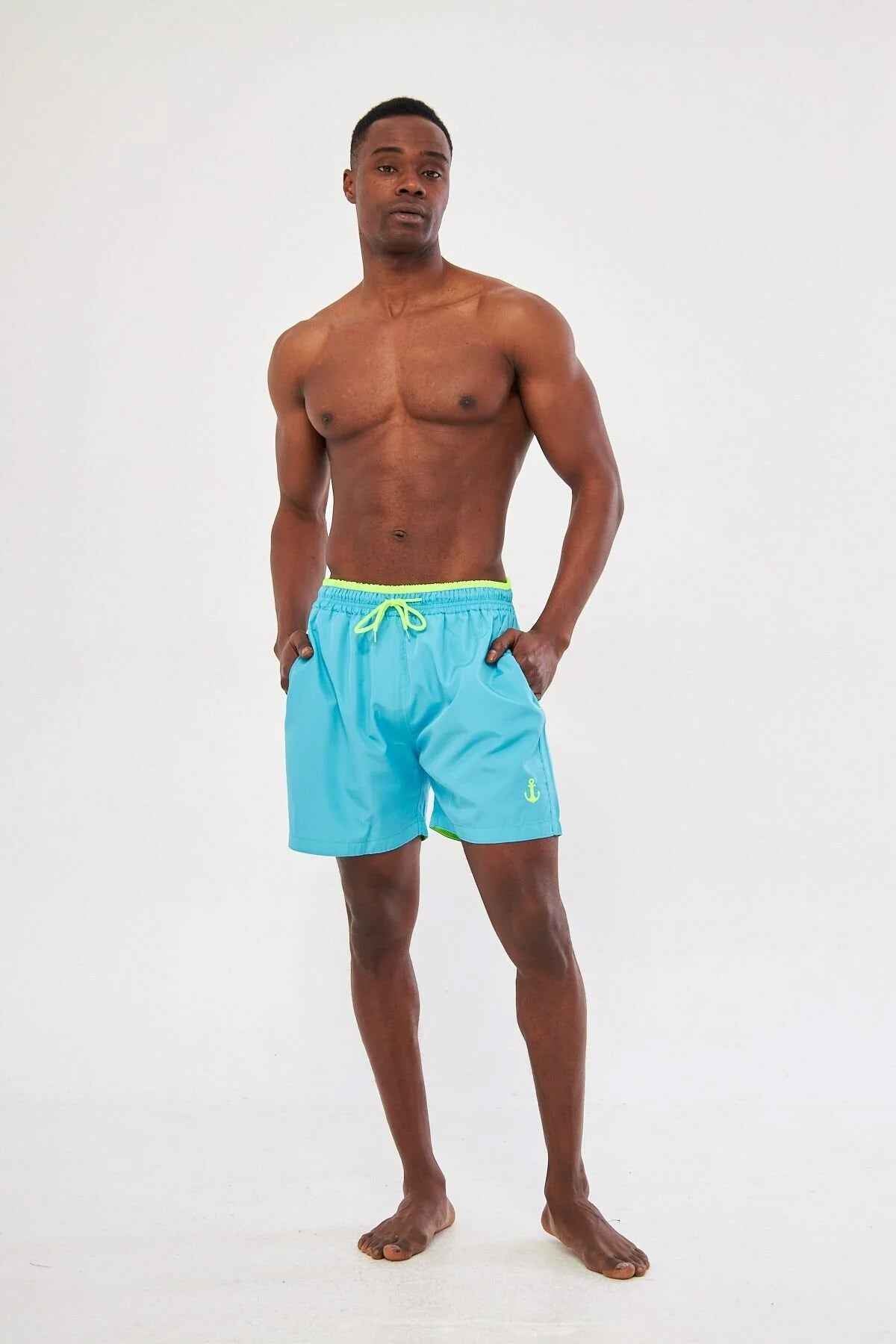Men's blue swimming shorts with yellow drawstring and elastic waistband