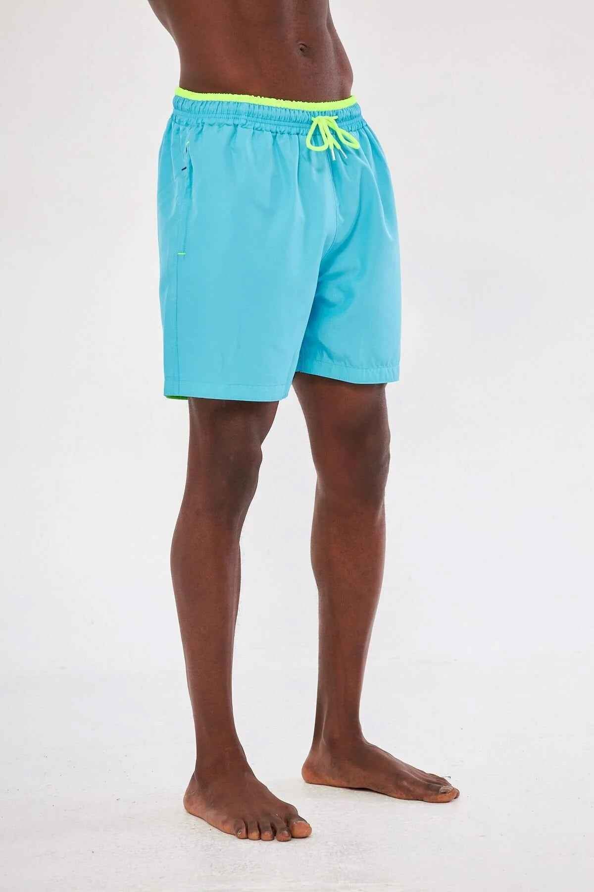 Men's blue swimming shorts with yellow drawstring and elastic waistband, side view