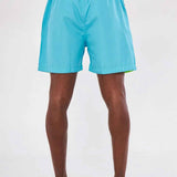 Men's blue swimming shorts with yellow elastic waistband, back view