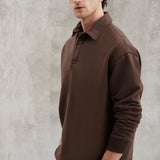 Brown collared sweatshirt with long sleeves, relaxed fit, shoulder view