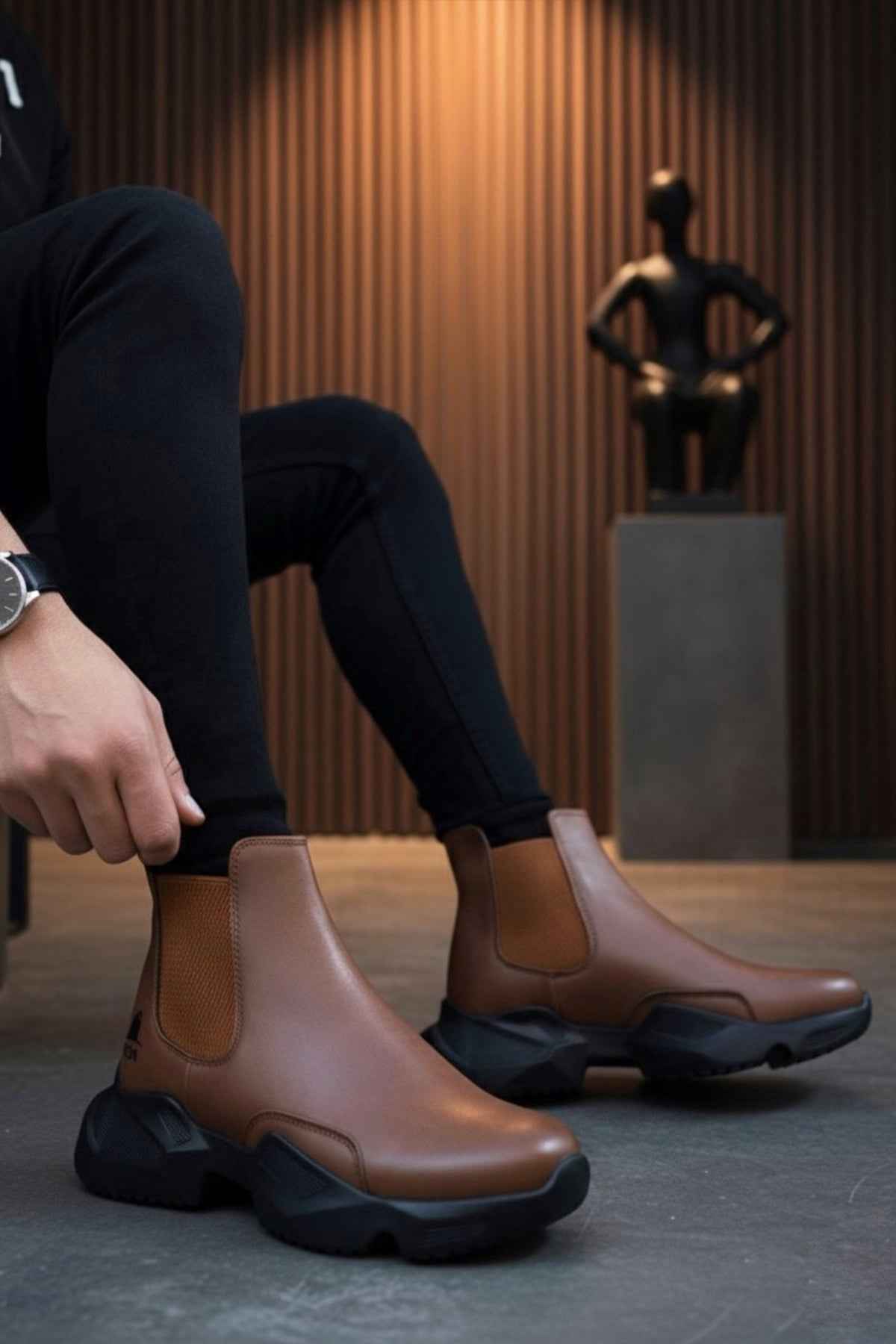 Men's brown ankle boots with dark outsole and side pull-on panels
