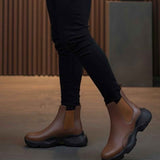 Men's brown ankle boots, dark rubber sole and ankle-height shaft
