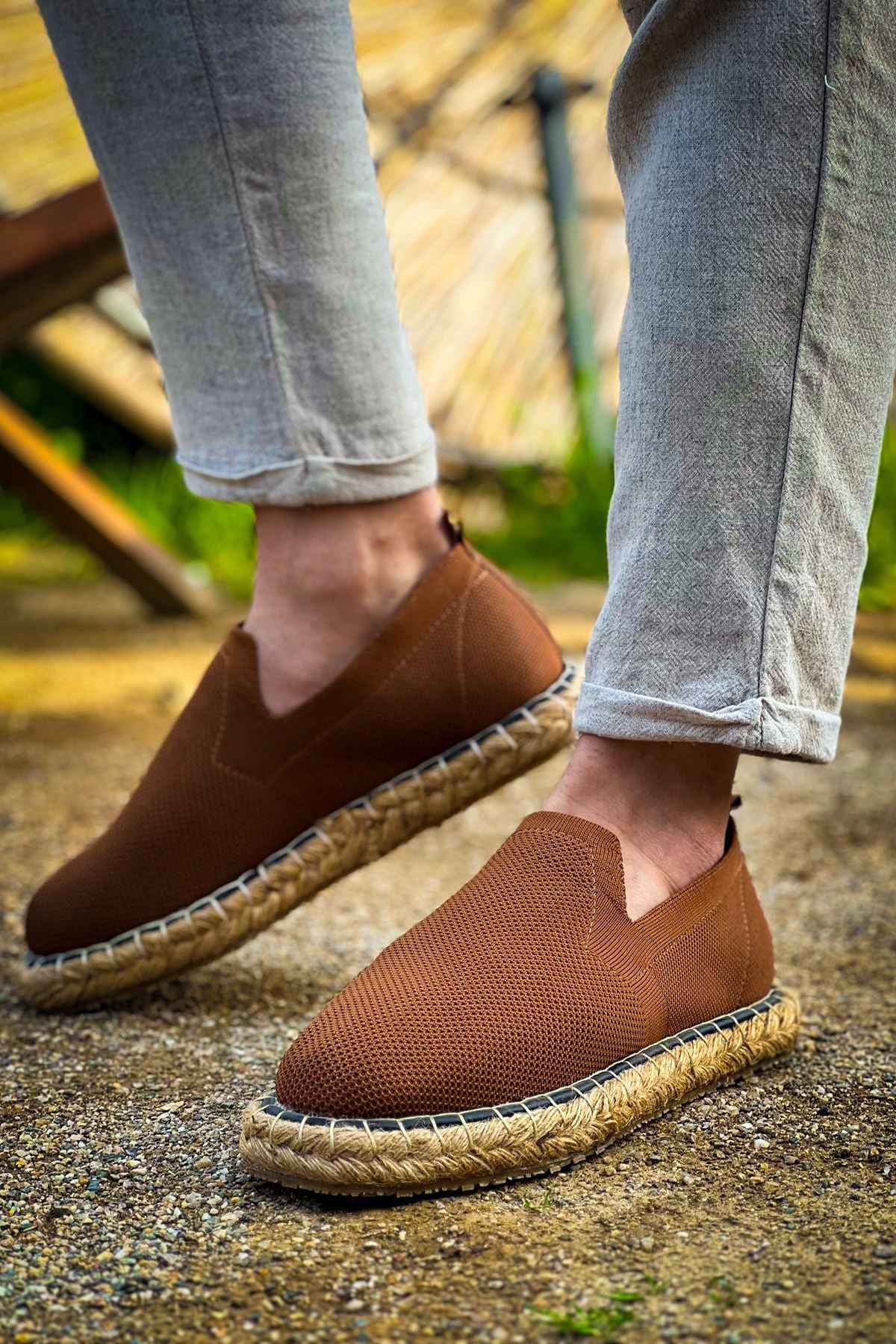 Brown espadrille slip-on shoes with woven jute midsole and fabric upper