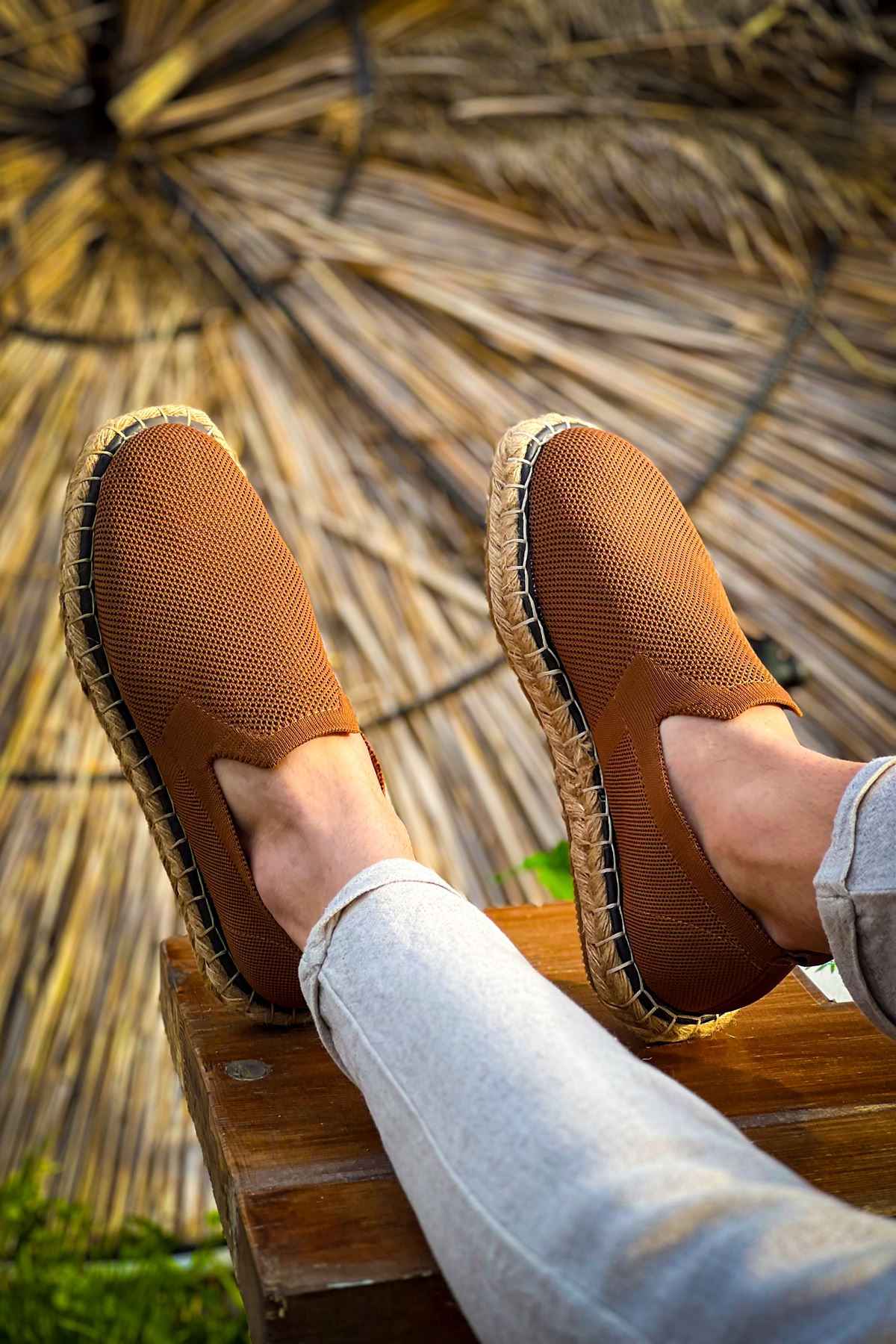 Brown espadrille slip-on shoes with jute sole and fabric upper