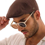 Ritag brown flat cap with curved brim and small top button