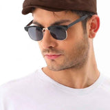 Brown flat cap with curved brim and side stitching