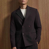 Men's dark brown double-breasted suit jacket with notch lapels and matching trousers