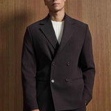 Men's dark brown oversized suit jacket with chest pocket and matching trousers