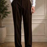 Men's brown pants with belt, front view, pleats and relaxed wide leg