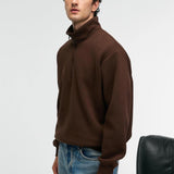 Brown relaxed-fit zip stand-collar sweatshirt, side profile with long sleeves