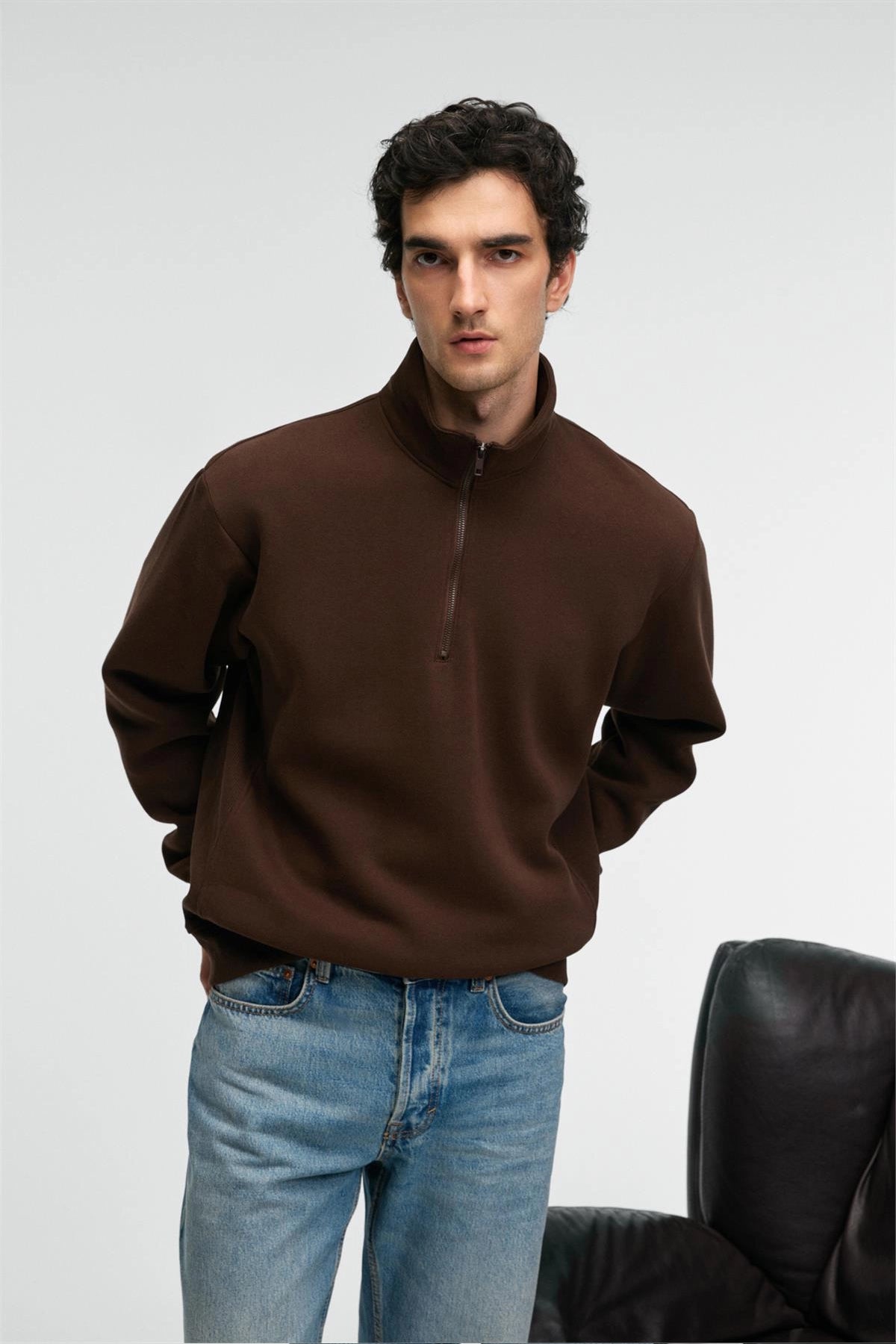 Brown relaxed-fit zip stand-collar sweatshirt, front half with zip neck