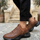 Men's brown suede sneakers with cushioned sole and side pull tab