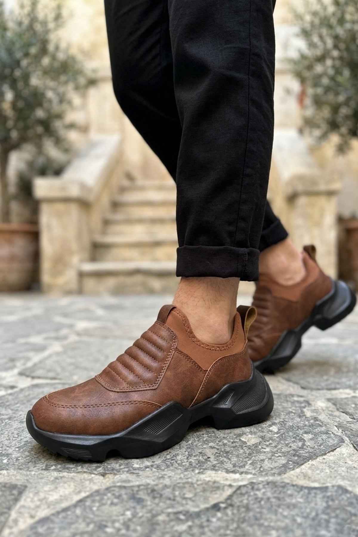 Men's brown suede sneakers with cushioned sole and side pull tab
