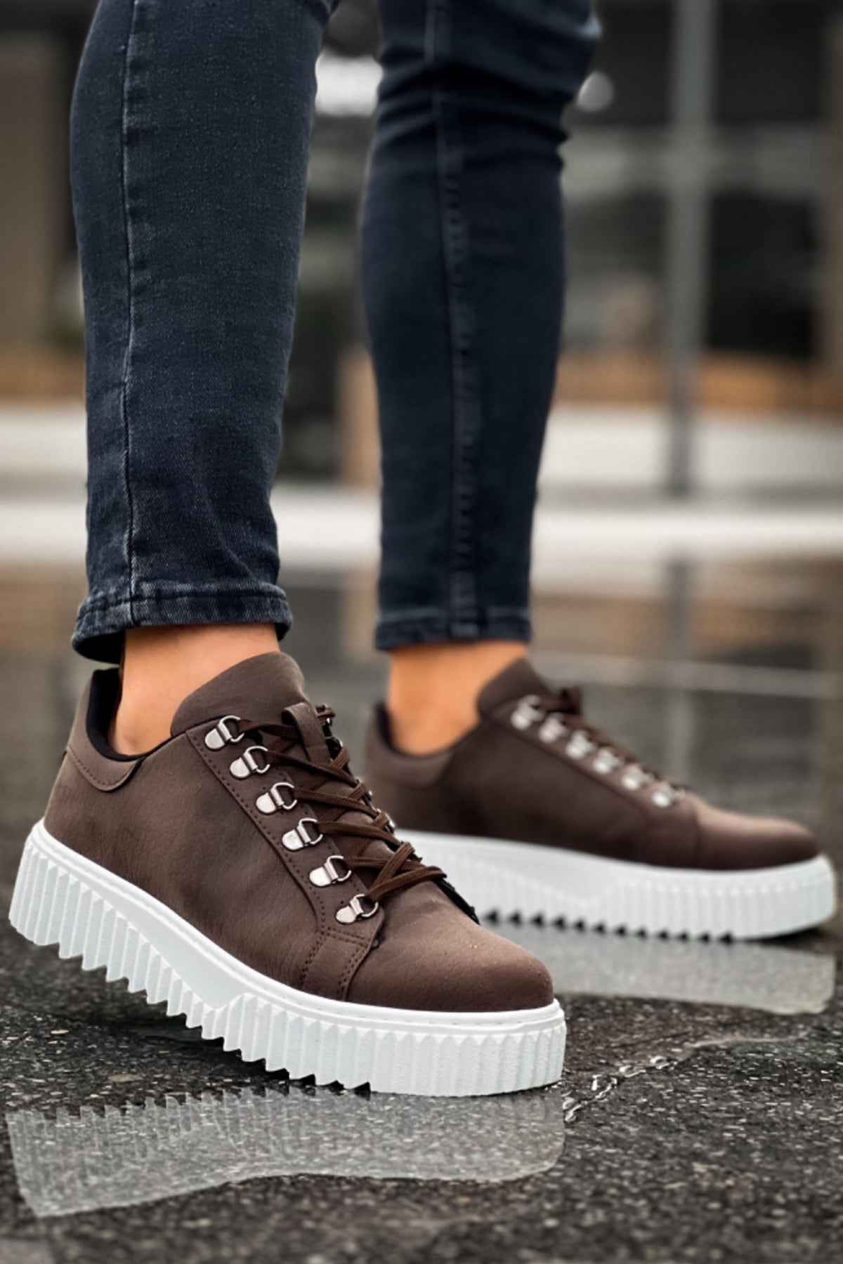 Men's brown lace-up sneakers with white chunky sole and side stitching