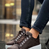 Men's brown lace-up sneakers with white platform sole and dark laces