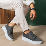 Men's dark gray casual sneakers with double strap closure and white sole