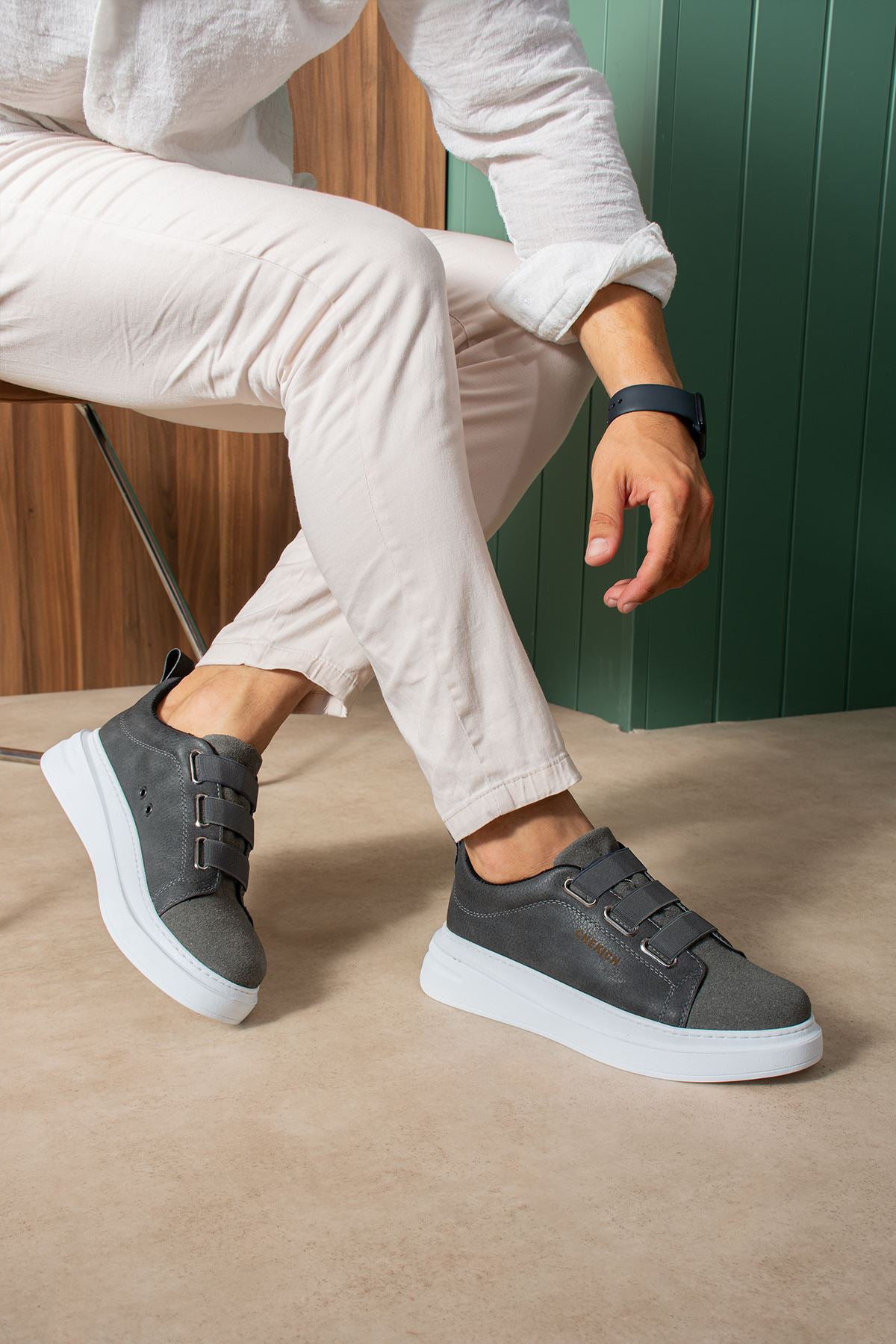 Men's dark gray casual sneakers with double strap closure and white sole