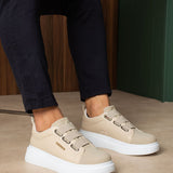 Beige casual sneakers side view with double straps and white sole