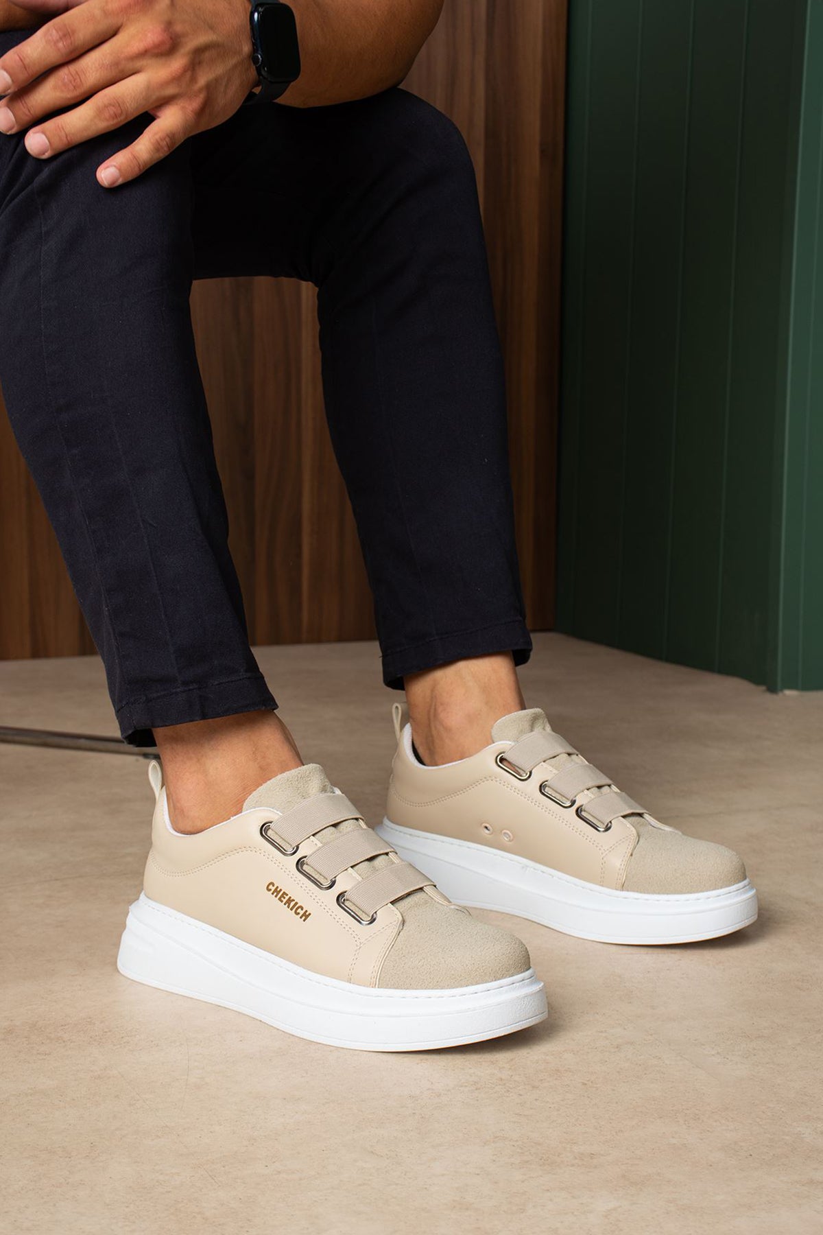 Beige casual sneakers side view with double straps and white sole