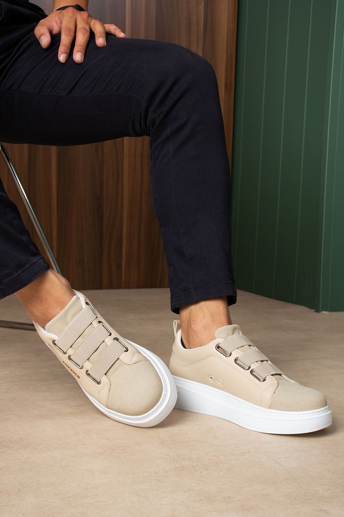Beige casual sneakers angled view, double straps and white rubber sole