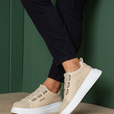 Beige casual sneakers diagonal view, double straps and thick white sole