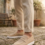 Men's beige suede loafer, side view with low-profile white sole