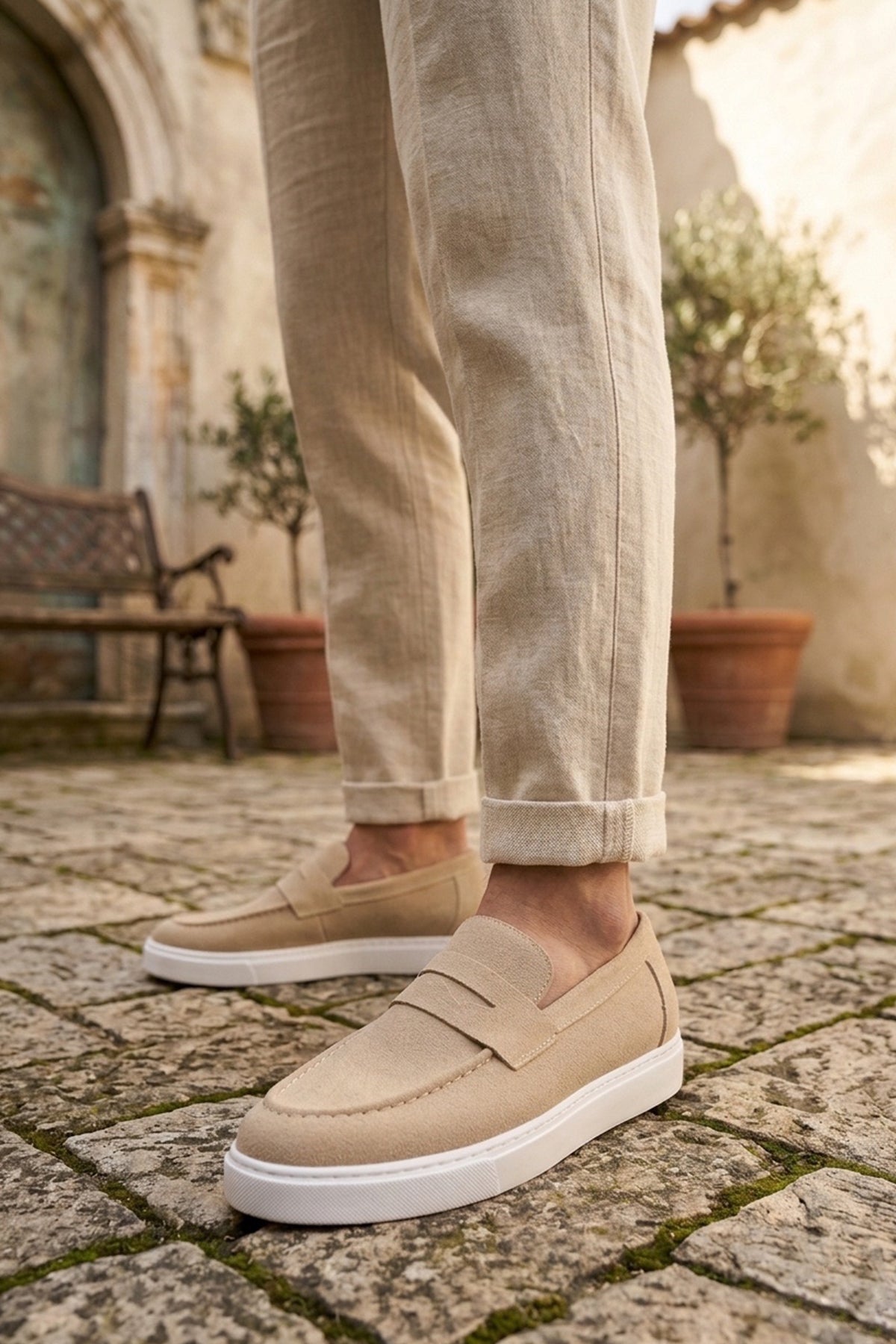 Men's beige suede loafer, side view with low-profile white sole