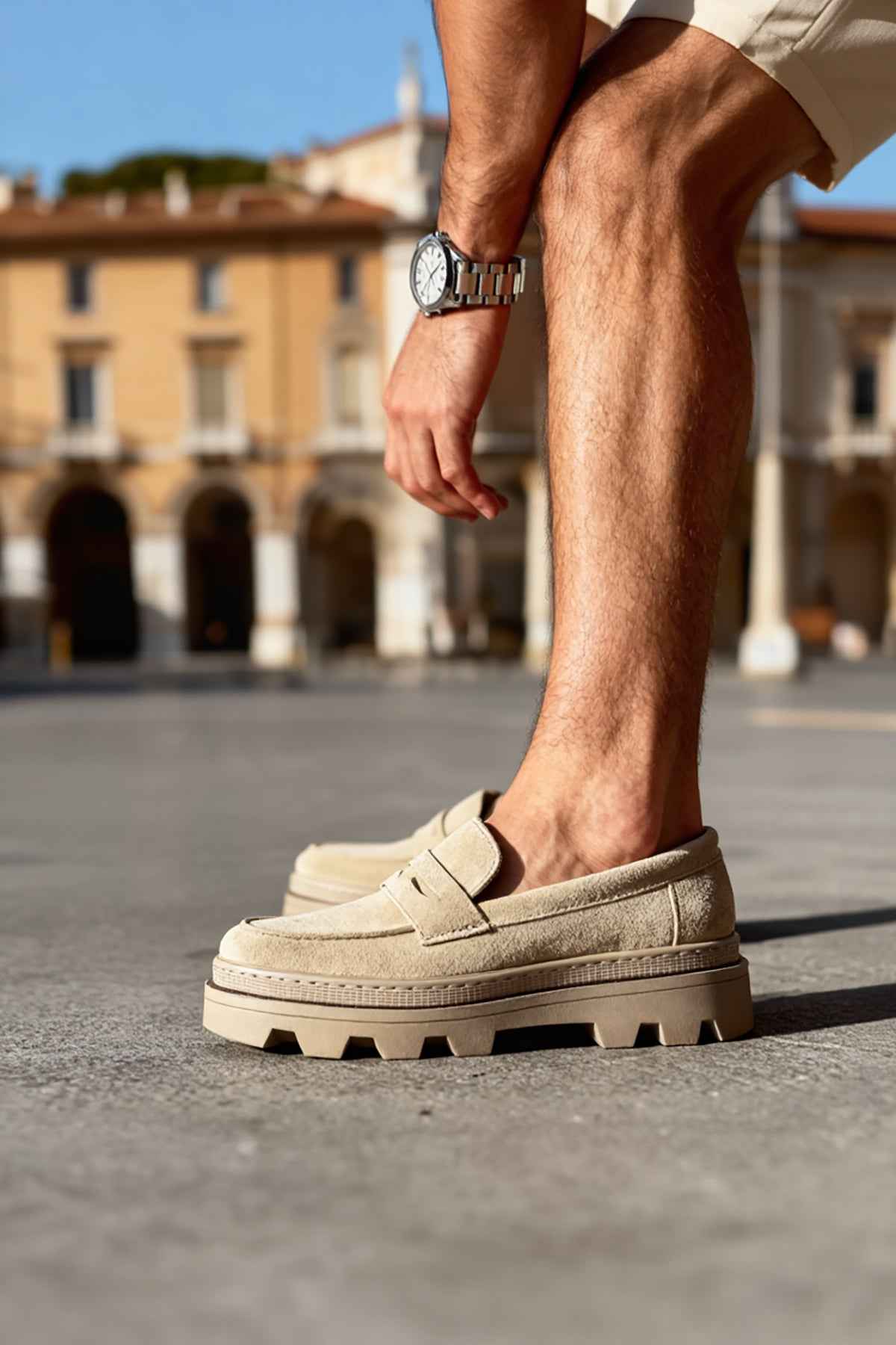Men's beige suede loafers, slip-on design with rugged tread sole