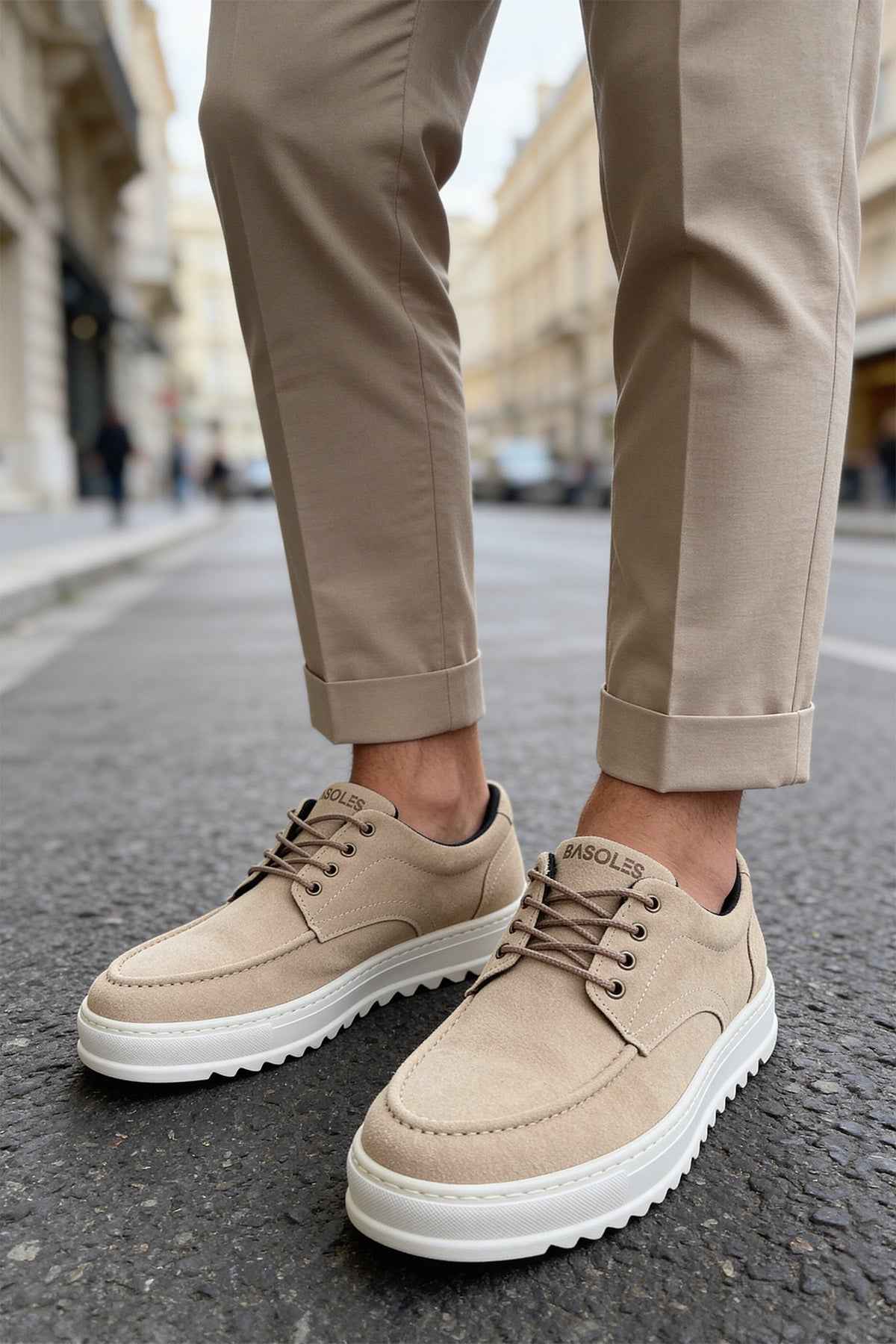 Beige suede lace-up sneakers with white rubber sole, side view