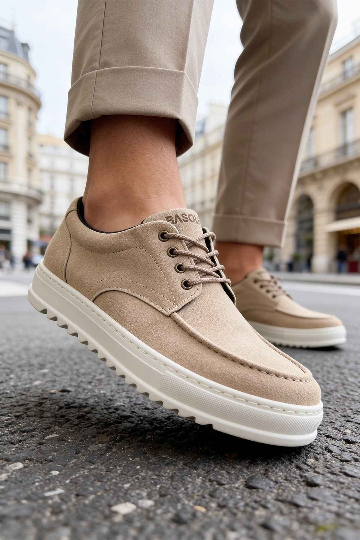 Beige suede lace-up sneakers with low profile white sole, close side view