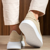 Beige suede sneakers heel and outsole detail with white rubber sole