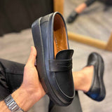 Men's casual black loafers, heel view of slip-on with padded collar