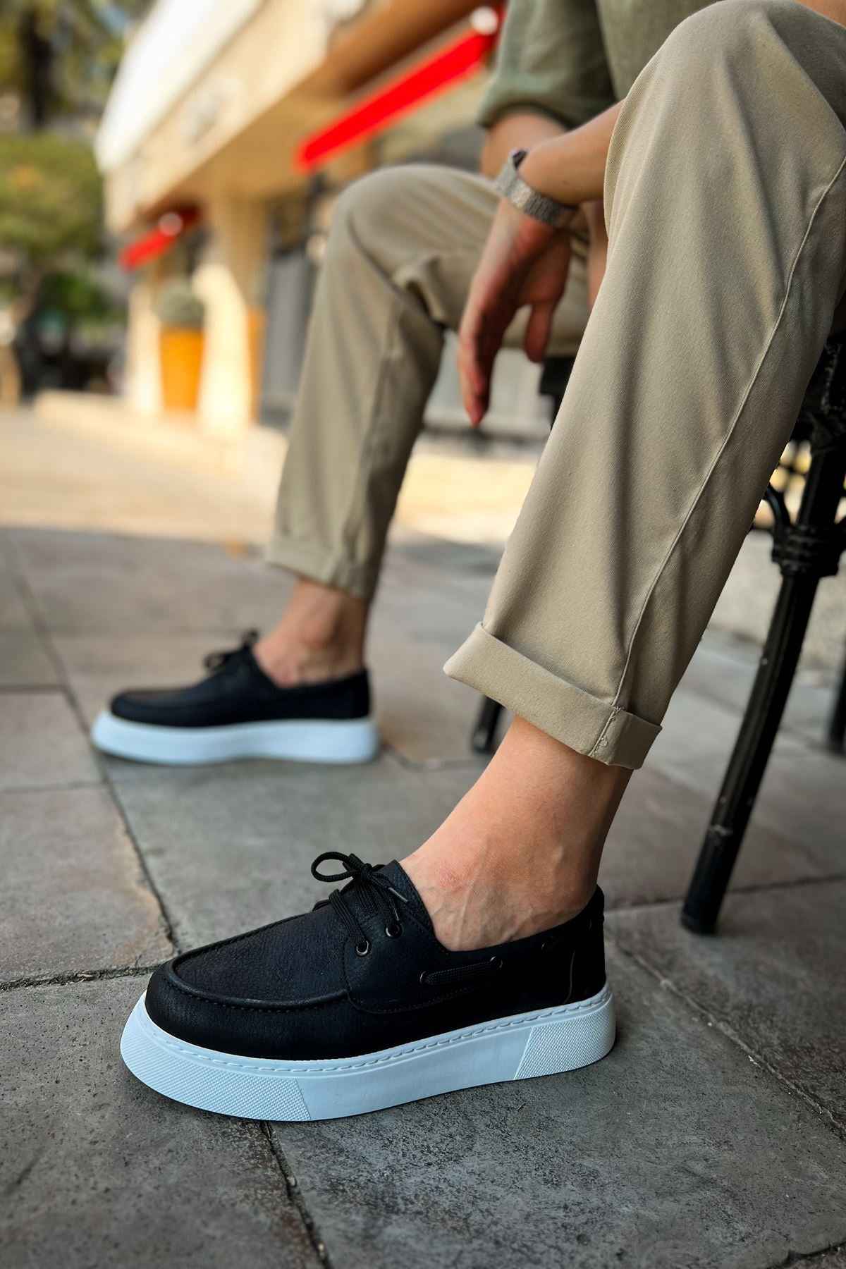 Men's casual black lace-up shoes, dark upper with light blue platform sole