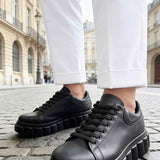 Men's casual black sneakers with lace-up design and chunky platform outsole