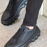 Men's casual black sneakers with lace-up vamp and chunky rubber sole
