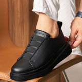 Black casual sneakers with padded collar and side seam detail