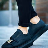 Black casual sneakers with side buckle strap and smooth leather upper