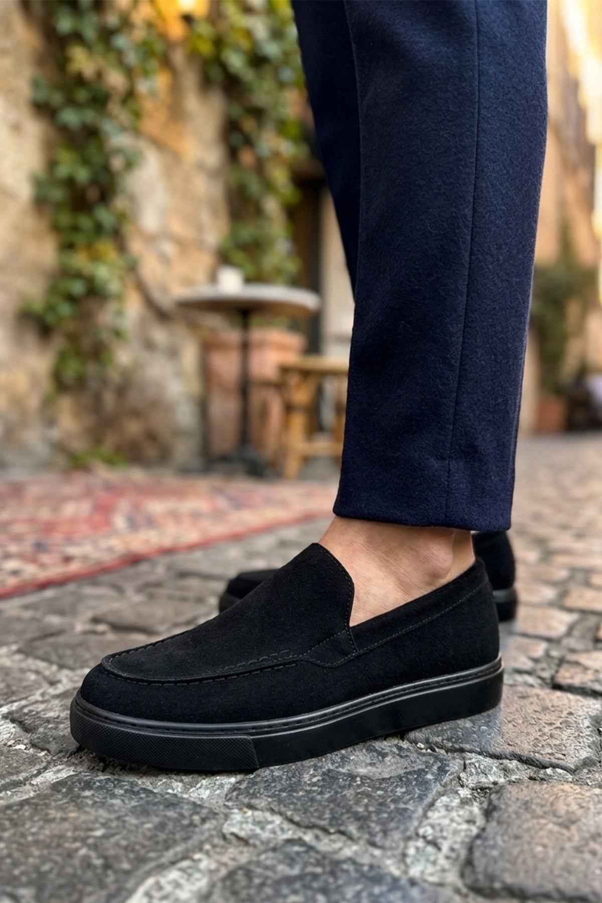 Men's black suede loafers, slip-on design with low profile sole