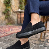 Men's black suede loafers, low-cut upper with side detailing and thick sole